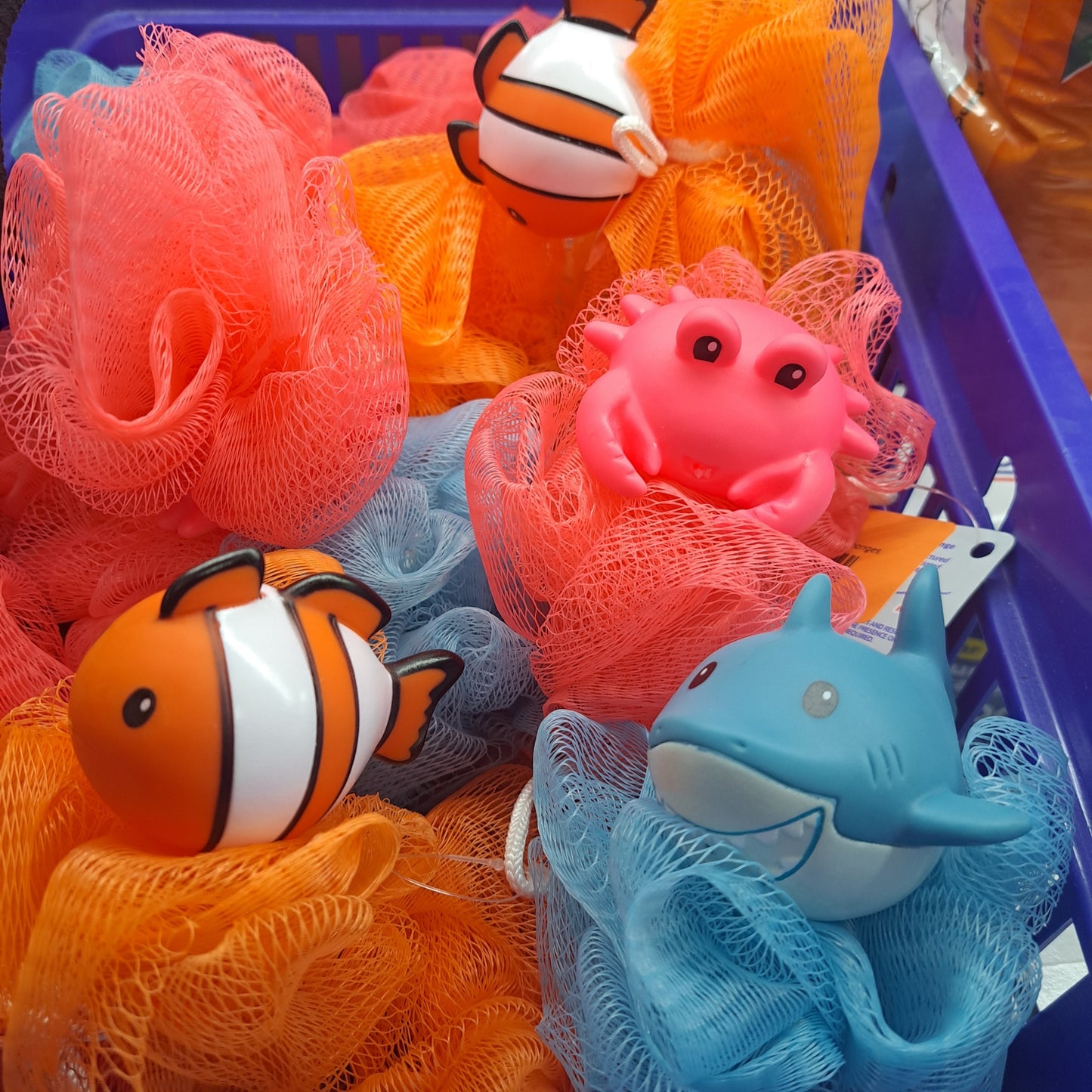 Kid's Animal Bath Sponges featuring toy fish, crab, and shark in a basket.