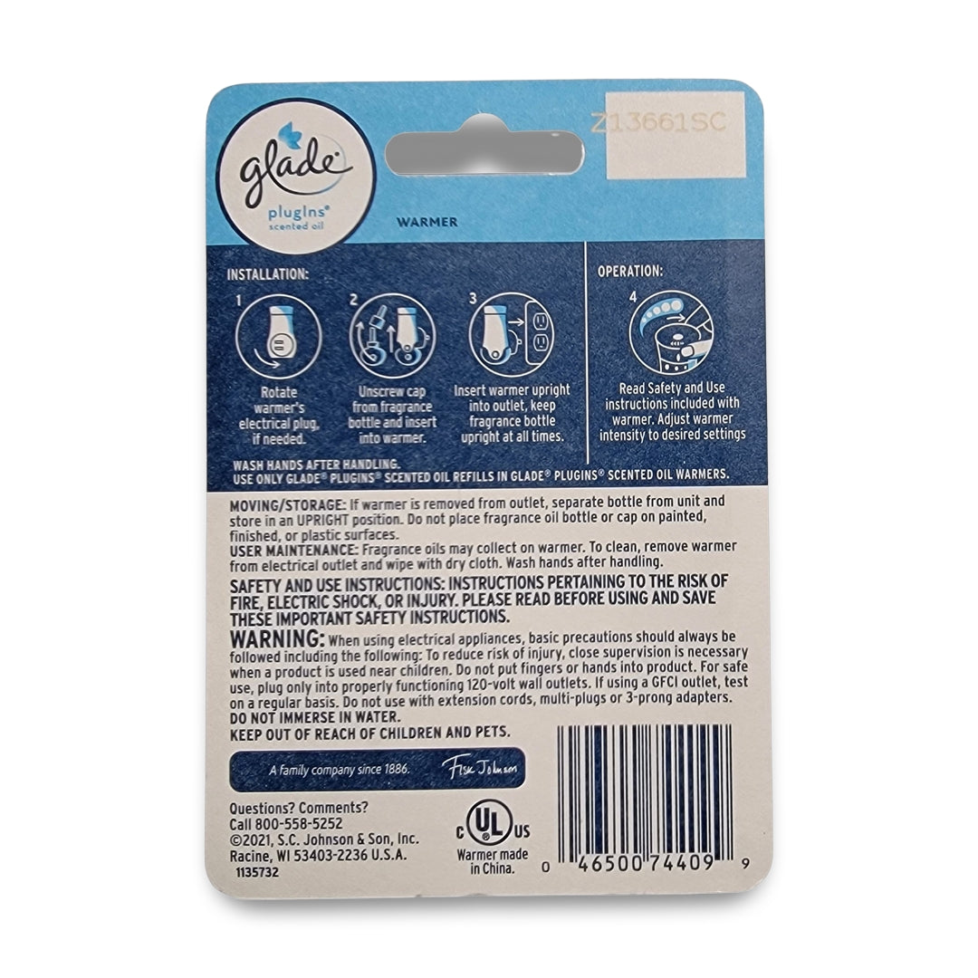 Back of a Glade Plug In Warmer package featuring installation and operation instructions, along with safety warnings.