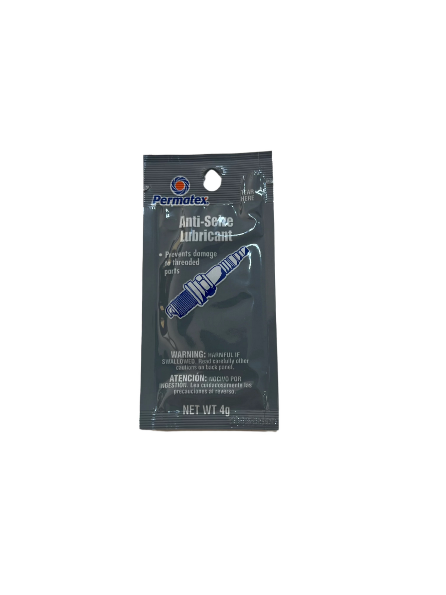 A 4g packet of anti seize lubricant featuring text about protecting threaded parts from damage, plus warning labels in both English and Spanish.