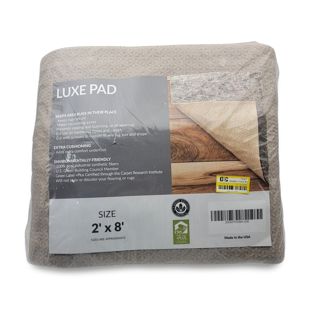A packaged Luxe pad keep area rugs in place underlayment, size 2' x 8', offering cushioning and eco-friendly features. Made in the USA.