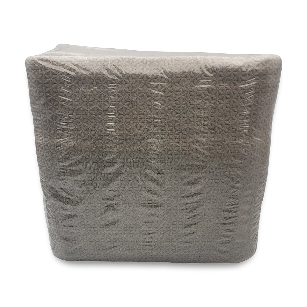 A large, unopened Luxe pad package wrapped in clear plastic with a brown textured pattern visible underneath.