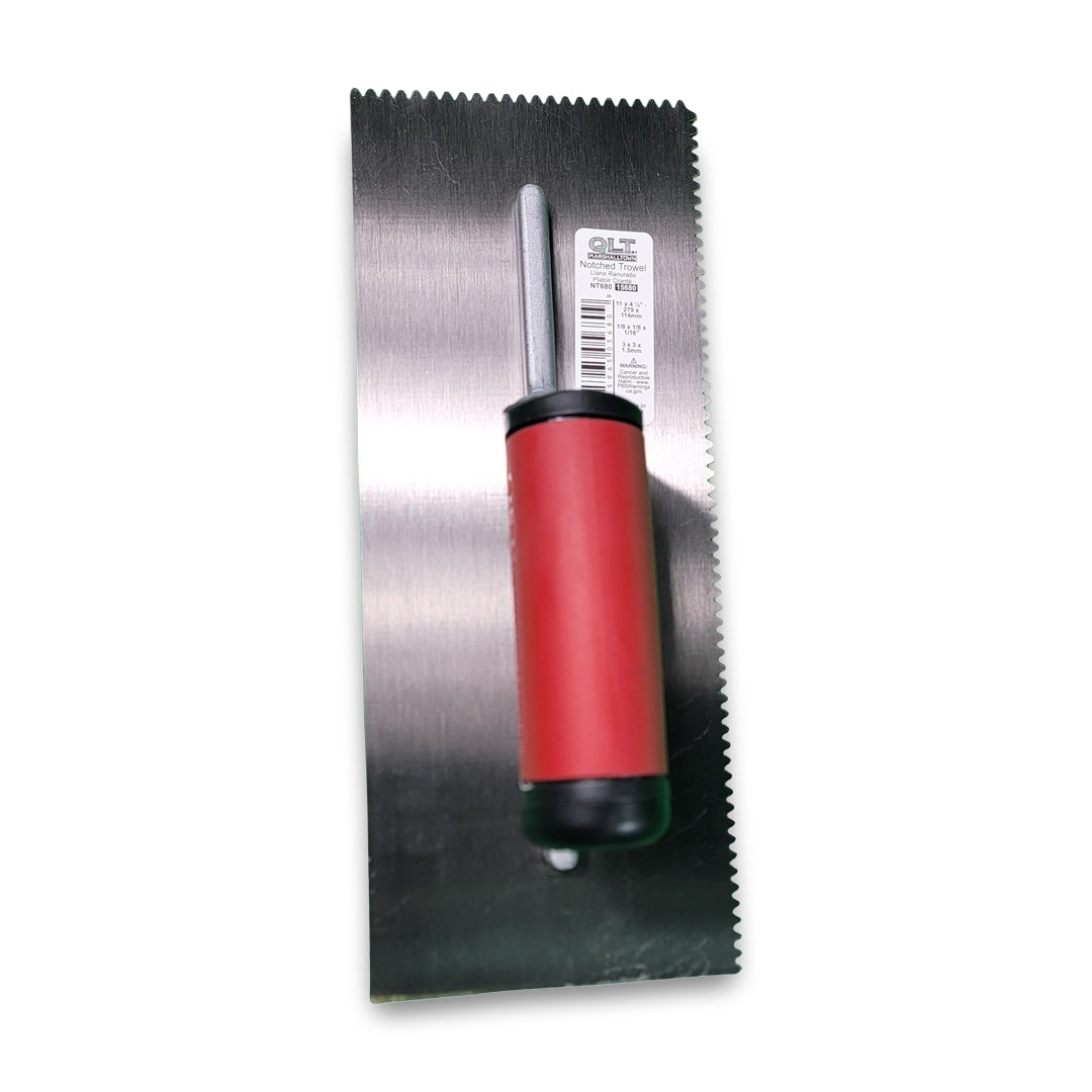 The QLT Notched Trowel features a red handle and metal blade with an attached price tag, set against a white background.