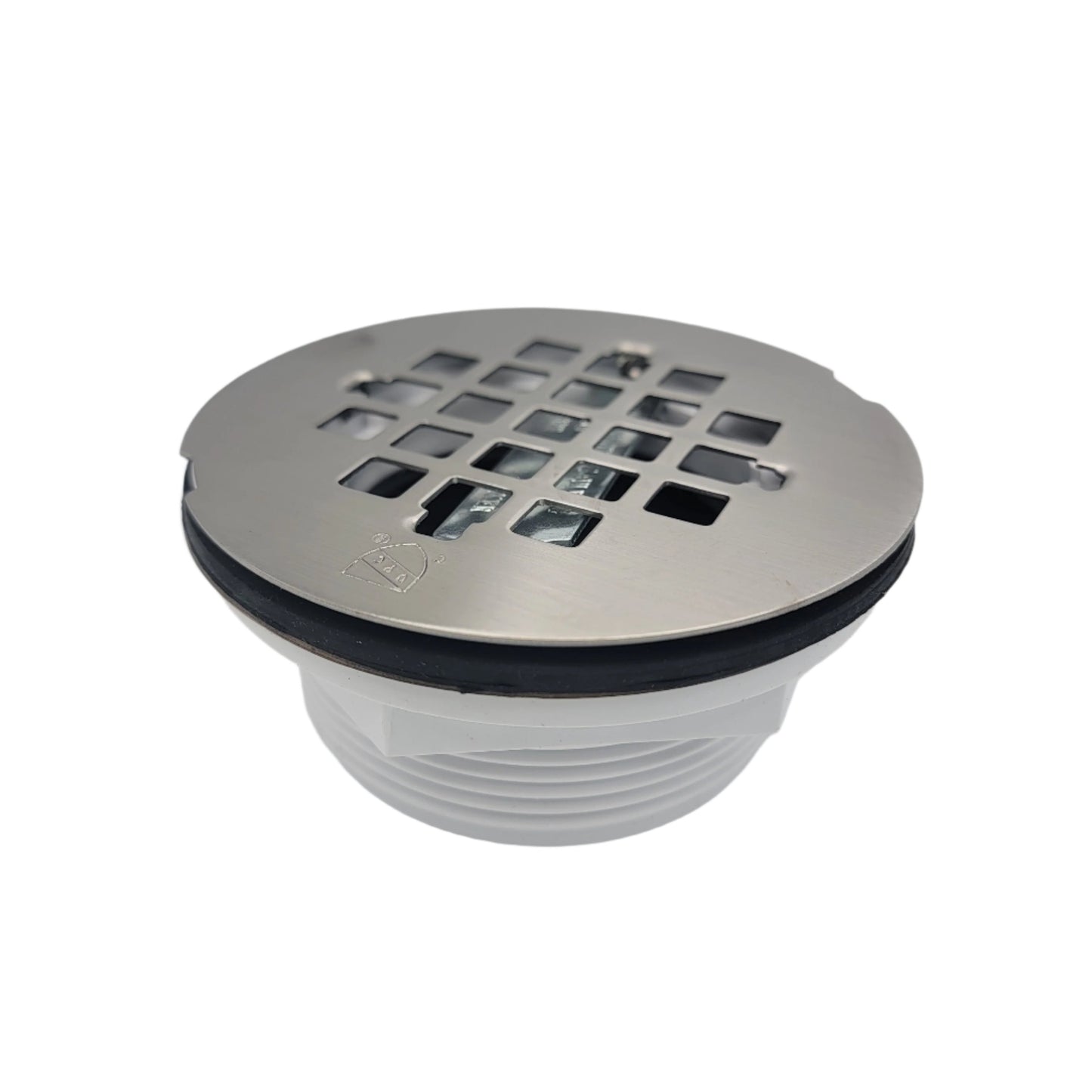 Westbrass d206p-20 PVC Compression shower drain features a metal cover with grid pattern and a black rubber seal, connected to a white pipe fitting.
