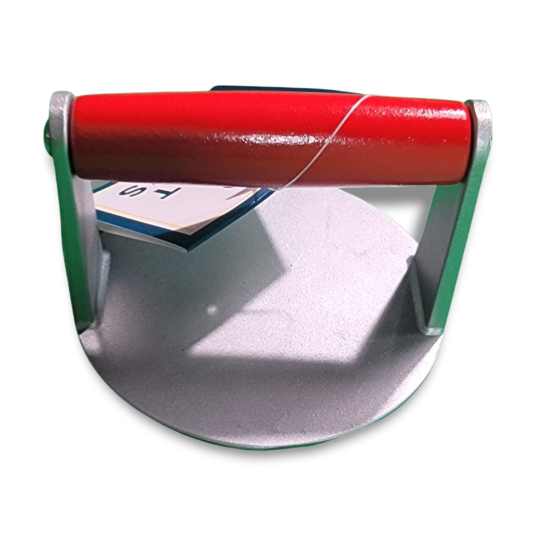 Meat press - Dad with a metal circular design featuring a red handle, viewed from above.