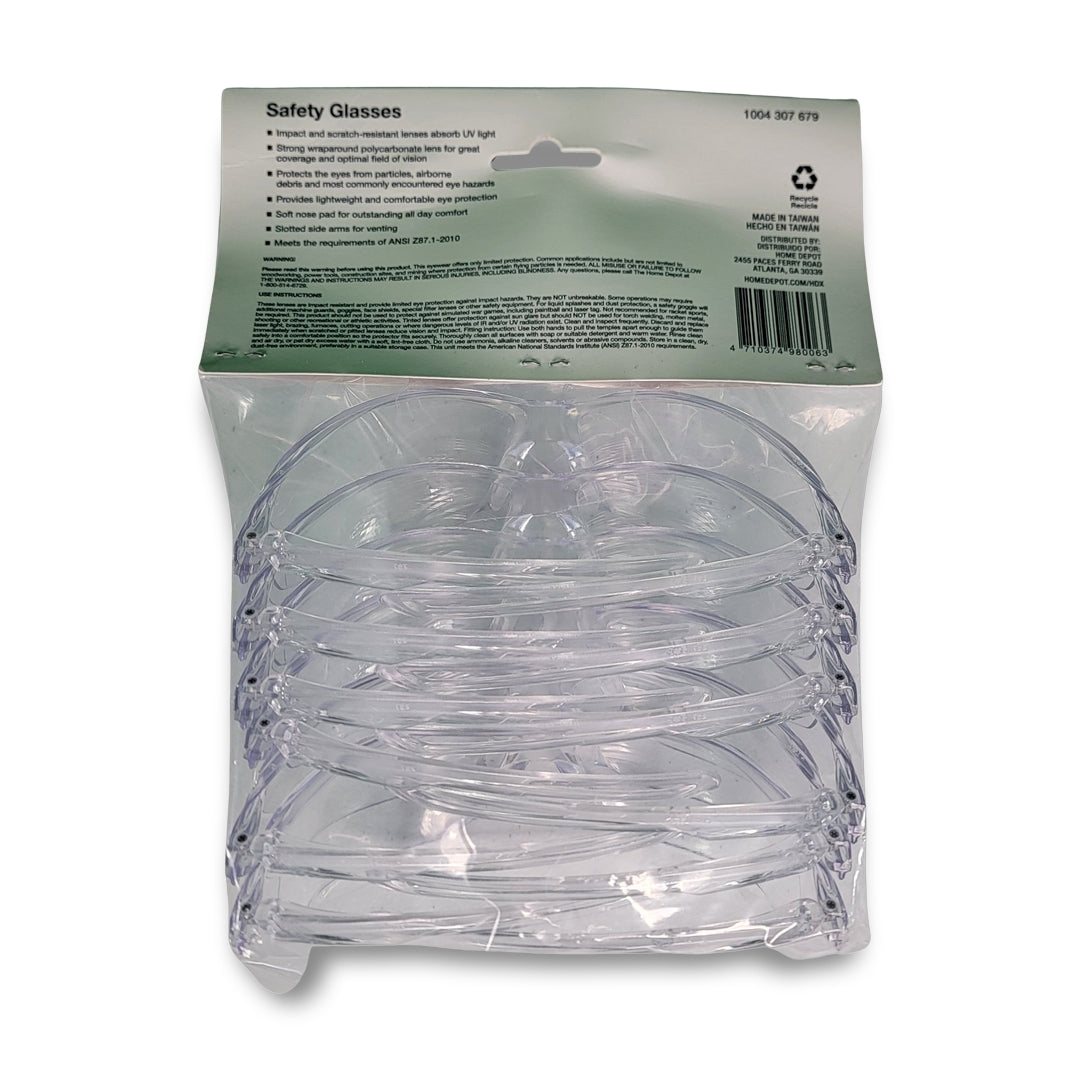 A pack of HDX 6-Pack Clear Lens Safety Glasses in plastic packaging with a cardboard top featuring product information and recycling symbols.