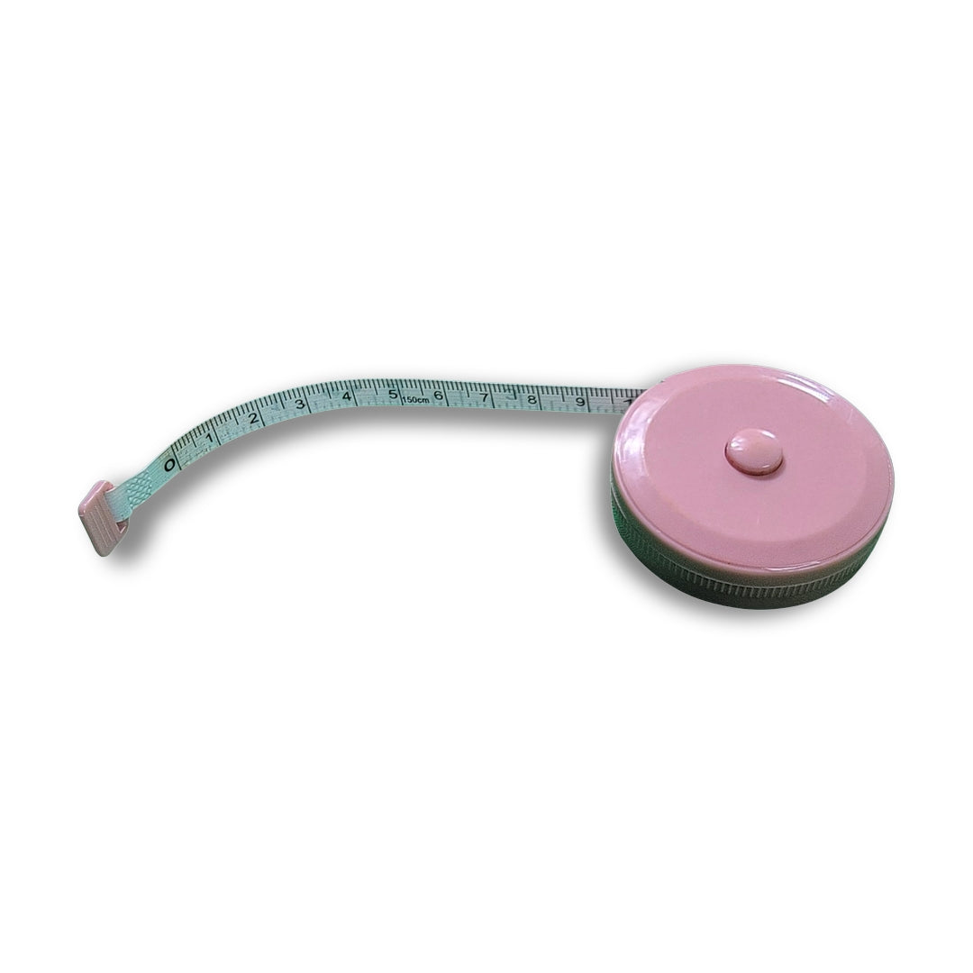 A pink purse measuring tape is extended on a white background.