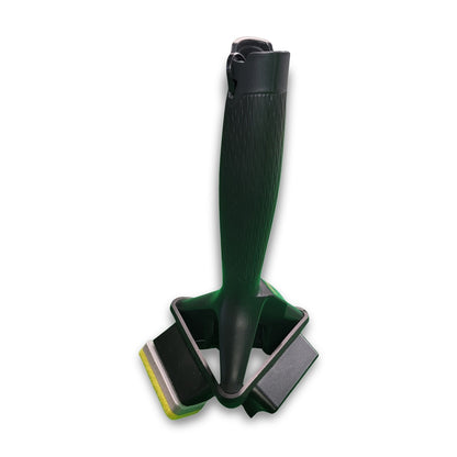 A Rubbermaid quick change tool, a black handheld knife sharpener featuring two sharpening slots and a textured grip handle, is displayed upright against a white background.