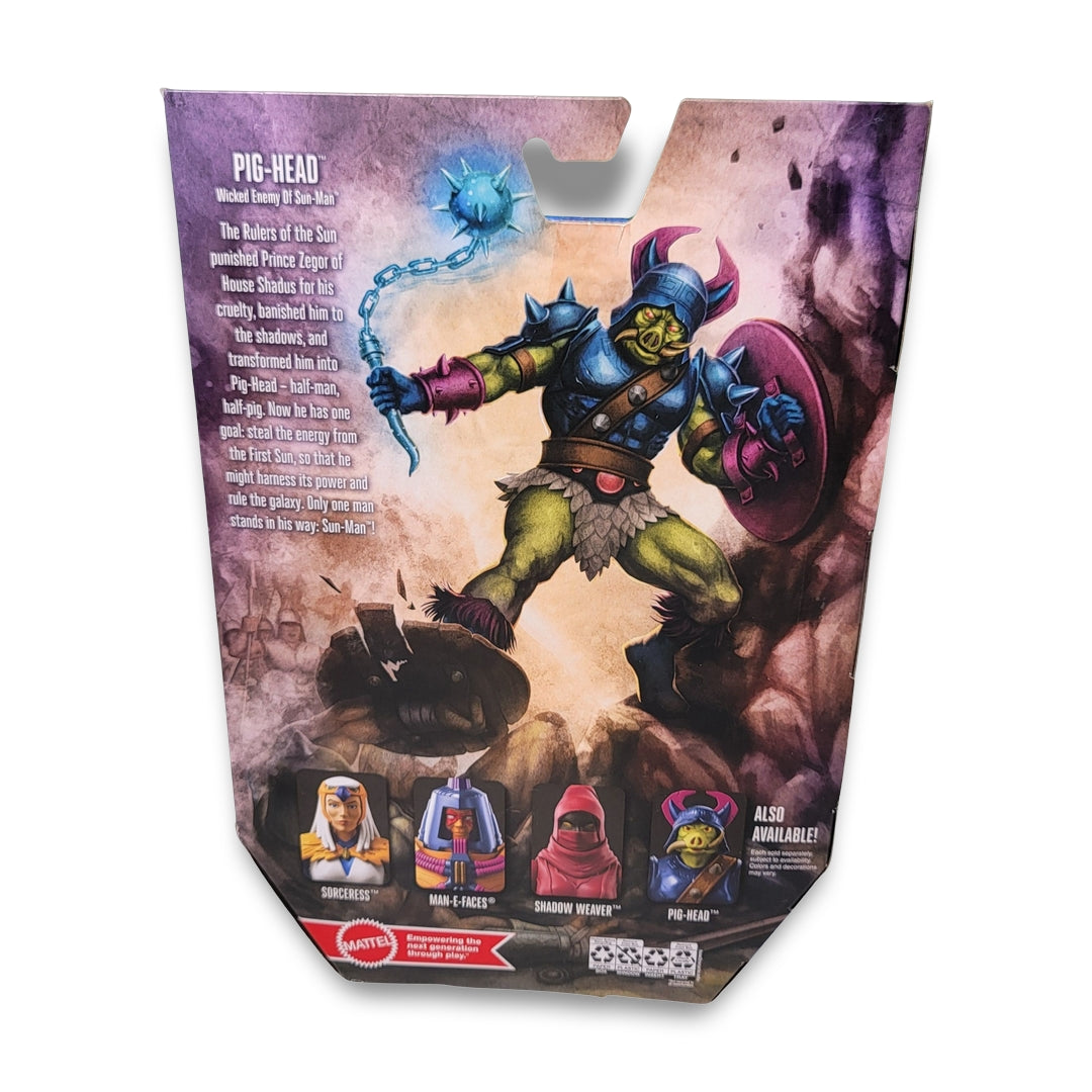 The "Masters of the Universe Masterverse Pig-Head Action" figure comes packaged with character details, armor, and mace. It describes Sun-Man, Space Sumo, Shadow Weaver figures and prominently features the He-Man logo.