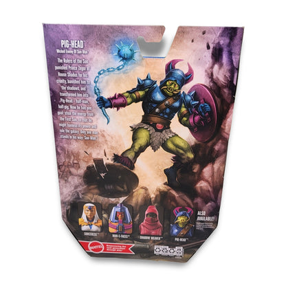 The "Masters of the Universe Masterverse Pig-Head Action" figure comes packaged with character details, armor, and mace. It describes Sun-Man, Space Sumo, Shadow Weaver figures and prominently features the He-Man logo.