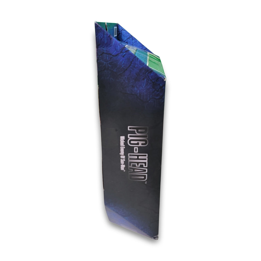 Side view of a folded, blue textured packaging for the Masters of the Universe Masterverse Pig-Head Action.