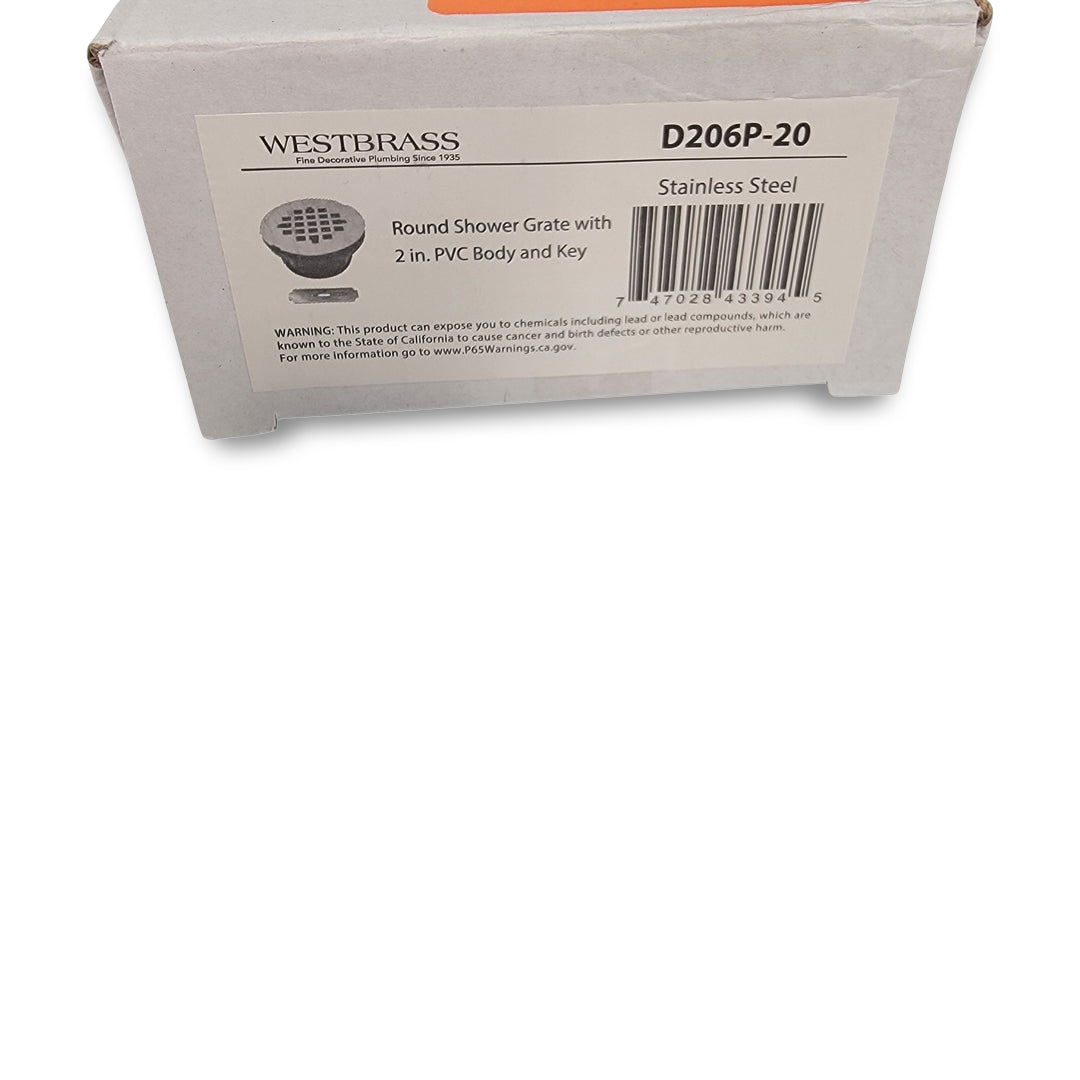 Box labeled "Westbrass d206p-20 PVC Compression Shower Drain," Westbrass brand, stainless steel.