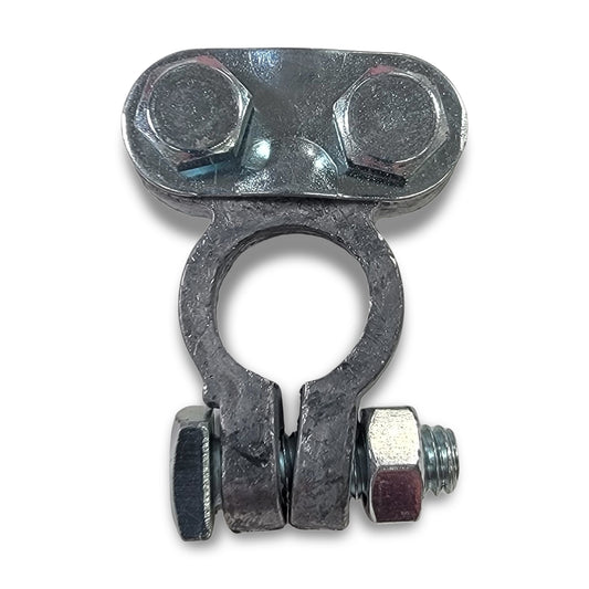 Battery terminal featuring a circular opening, with two top bolts and a lower fastening bolt.